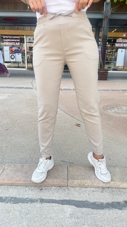 Full likralı paçası kıvrık  model pantolon bej