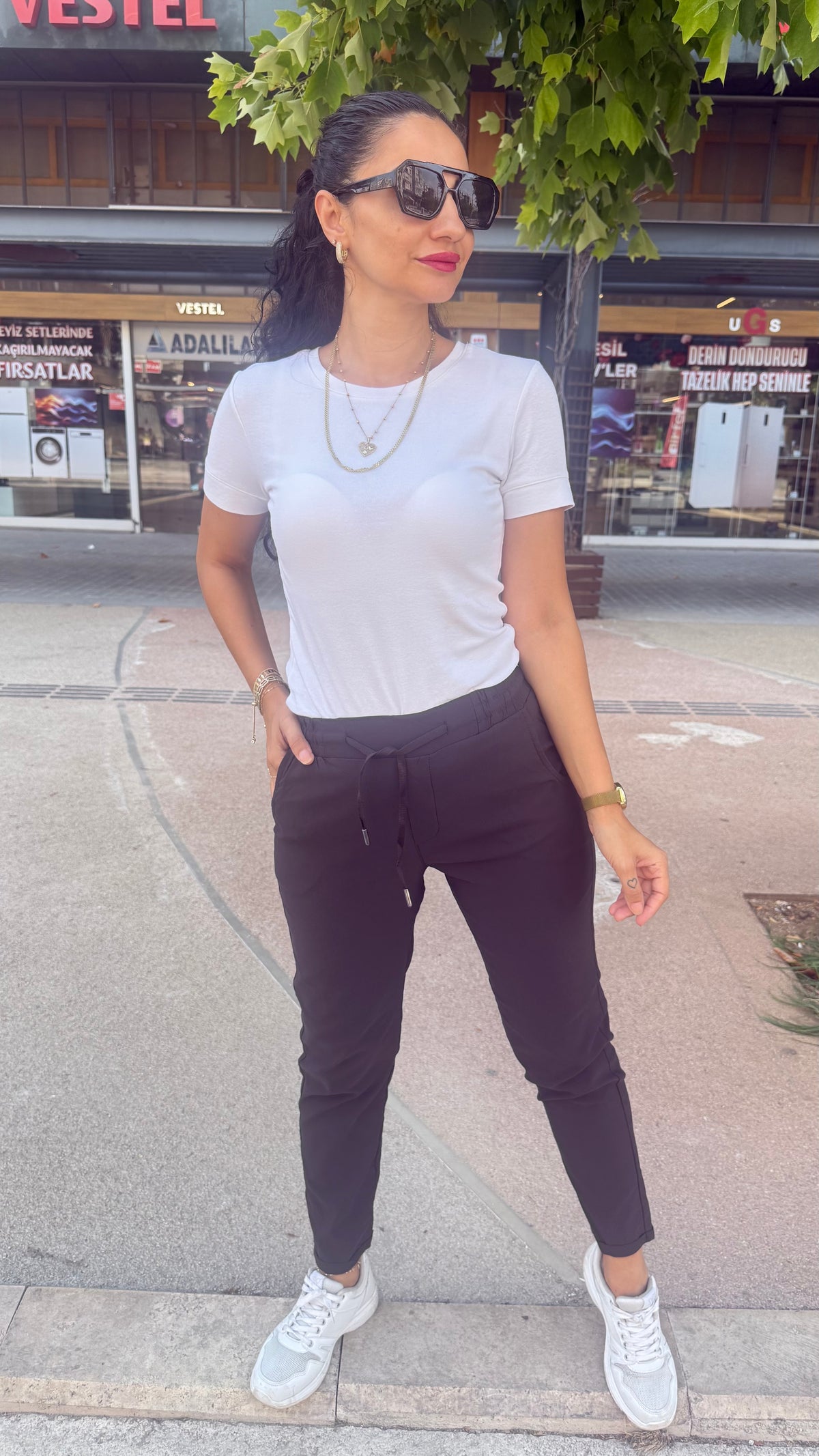 Full likralı paçası kıvrık model pantolon kahverengi