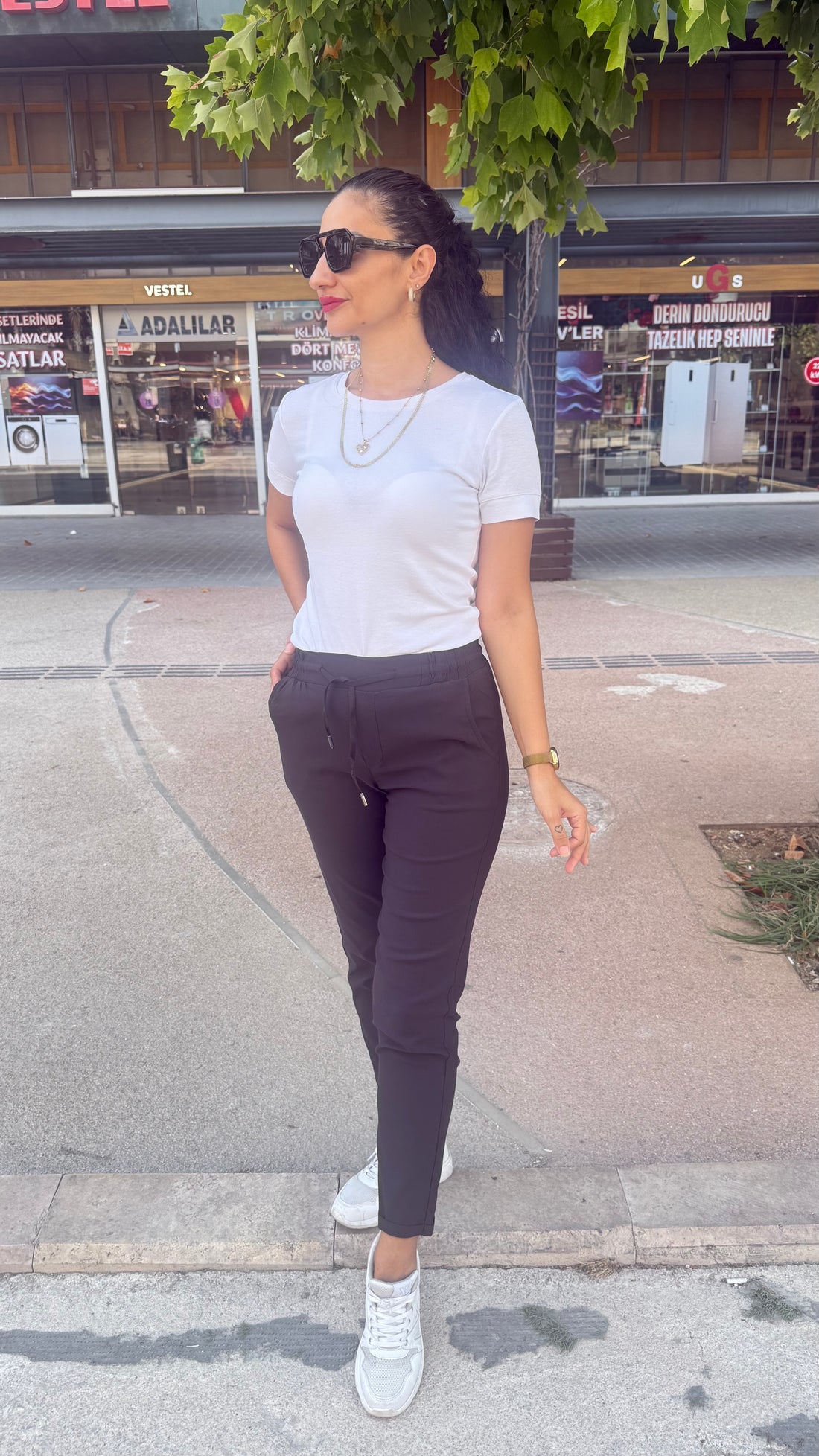 Full likralı paçası kıvrık model pantolon kahverengi