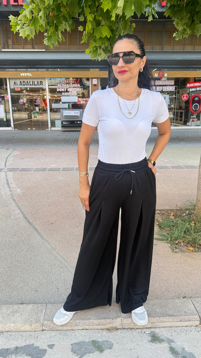 Beli lastikli pensli pantolon siyah